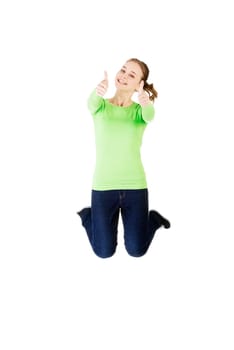 Young happy caucasian woman jumping in the air with thumbs up , isolated on white background