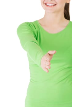 A beautiful young adult woman about to shake hands.