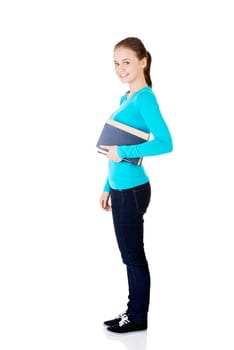 Young caucasian woman (student) with book , isolated on white