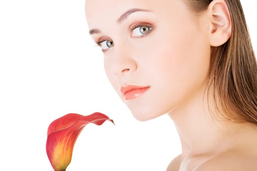 Beauty face of the young beautiful woman with flower. Girl on white background