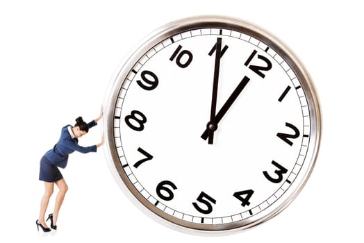 Business woman is pushing a big clock.