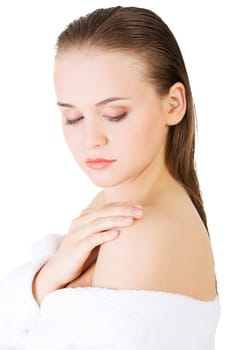Attractive woman with a bathrobe, isolated on white
