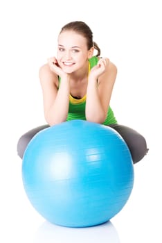 Beautiful young healthy lifestyle woman with pilates exercise ball.