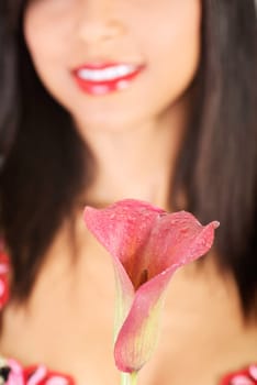Sexy woman in lingrie with red flower. Over white background