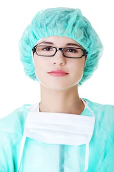 Portrait of female surgeon or nurse wearing protective uniform