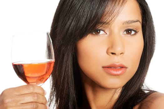 Portrait of young happy beautiful woman with glass of rose wine