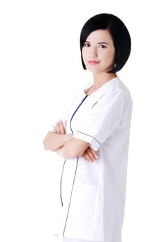 Nurse or young doctor standing smiling. Isolated on white background.