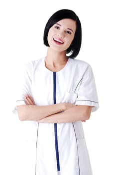 Nurse or young doctor standing smiling. Isolated on white background.
