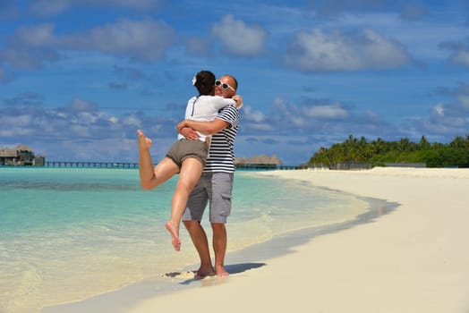 happy young couple relax and take fresh drink at summer vacation