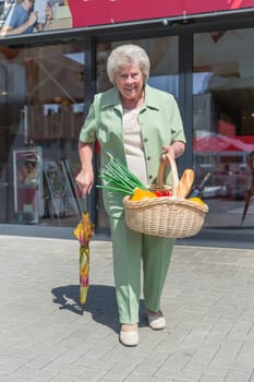 Elderly lady leaving a shopping mall