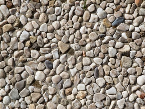 Pebbles on concrete substrate