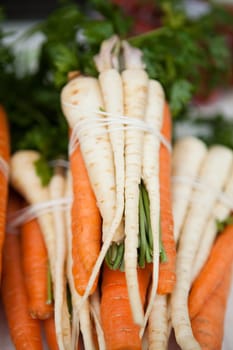 Closeup of fresh carrots on sale at produce market