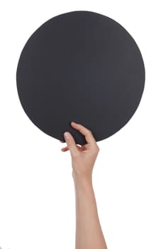 Hand Holding a Black Circle with Copyspace on it, Isolated