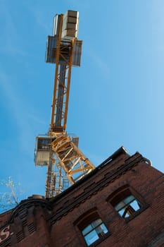 Construction crane in a ruined building