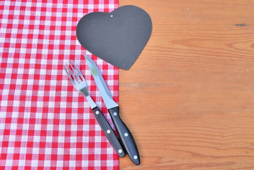 Cutlery red checkered background rustic