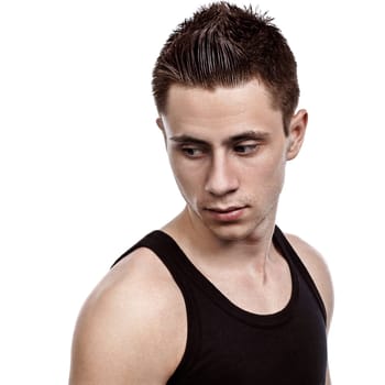 Young handsome man in black looking down