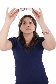 hispanic young woman checking her eyeglasses