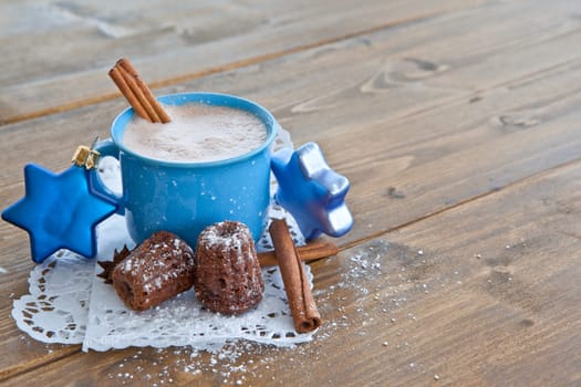 Hot chocolate with small cakes at Christmas time