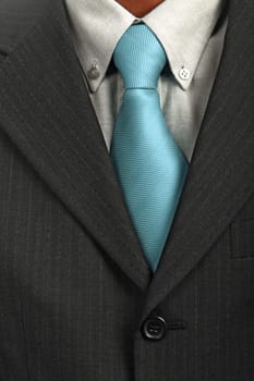 detail of a Business man Suit with blue tie