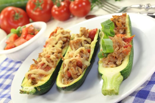 baked zucchinis stuffed with minced meat and tomatoes