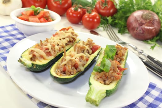 baked zucchinis stuffed with minced meat and tomatoes