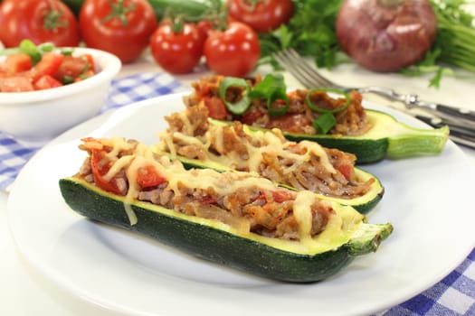 baked zucchinis stuffed with minced meat and tomatoes