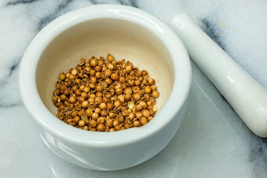 Coriander in a mortar