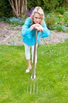 Blonde with pitchfork