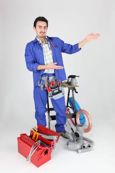 plumber showing with his hands