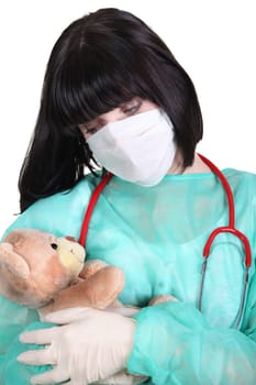 Nuse with a teddy bear
