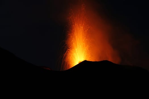 volcano erupting with Strombolian eruption