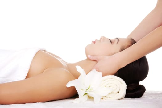 Preaty young woman relaxing heaving massage therapy in spa saloon