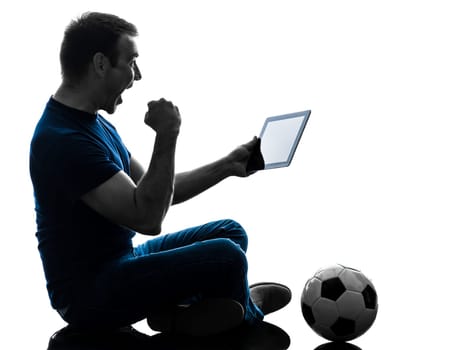 one caucasian man holding digital tablet   in silhouette on white background