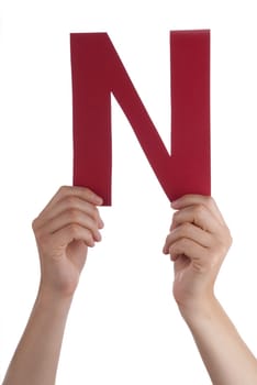 Hands Holding the Red Letter N, Isolated