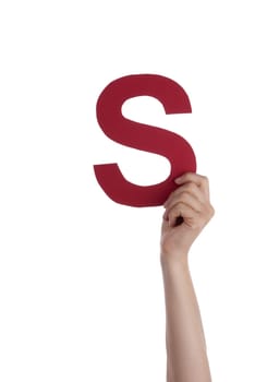 A Hand Holding the Red Letter S, Isolated