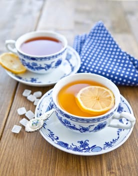 Various teas with fresh lemon and candy sugar