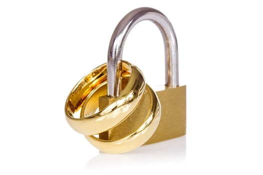 Together forever. Golden wedding ring locked for forever love