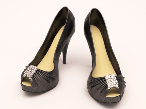 Women's black sexy shoes closeup on a light background