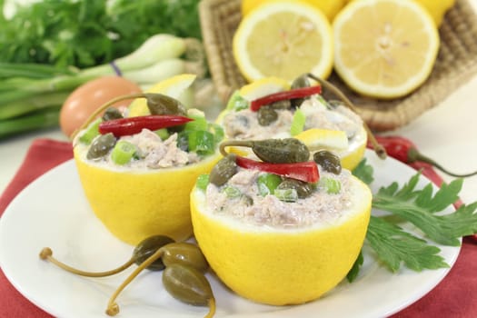 lemons stuffed with tuna cream and capers