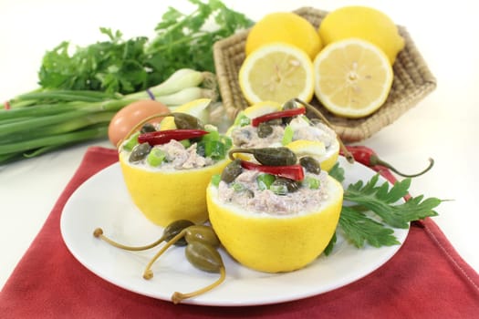 lemons stuffed with tuna cream and capers
