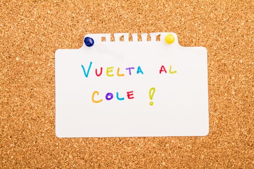 Cork board with a note..