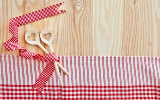 Rustic background with wooden cooking loeffels