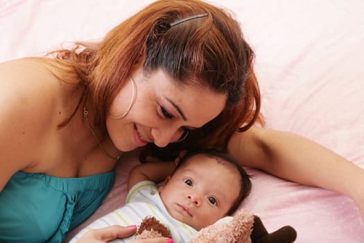 Hispanic mother with her adopted boy