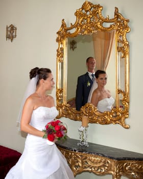 Wedding couple in the mirror