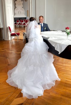 Groom at the grand piano