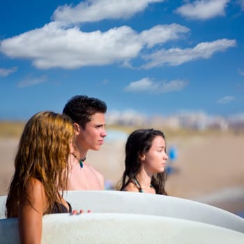 Teenager surfers group happy in beach shore sunnu day