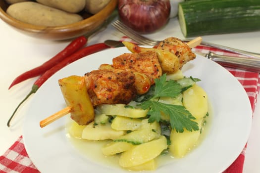 Potato-cucumber salad with a fiery skewer