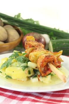 Potato-cucumber salad with a fiery skewer
