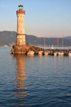Picturesque view on the entrance of the harbor in Lindau island on Lake Bodensee, Germany