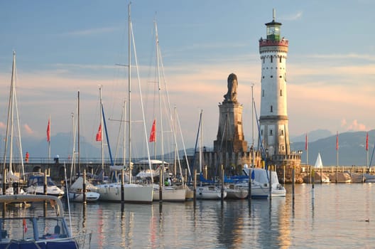 Picturesque view on the entrance of the harbor in Lindau island on Lake Bodensee, Germany